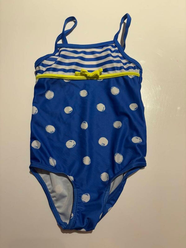 Blauw badpak met witte bollen en strepen