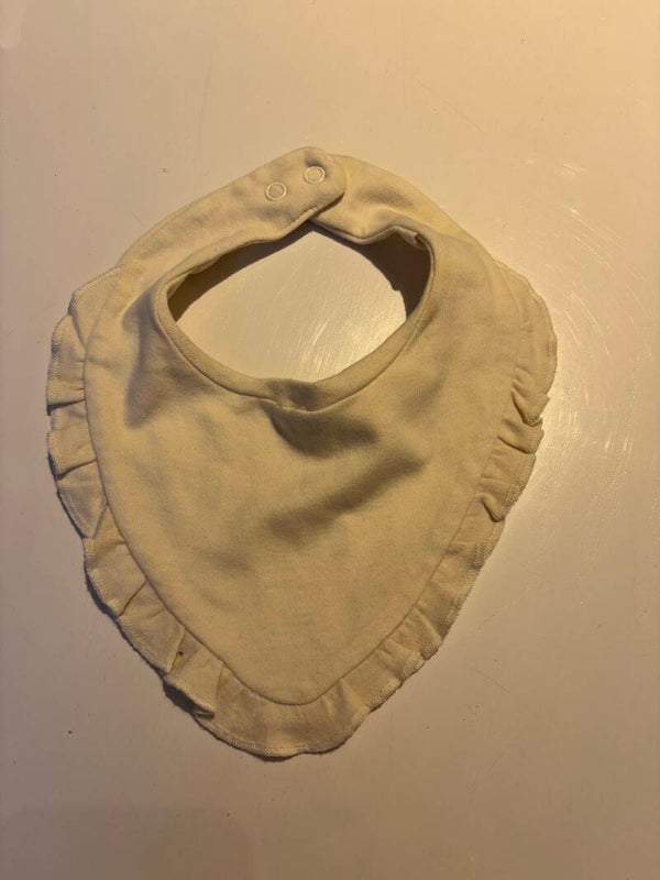 Crèmekleurige kwijlslab