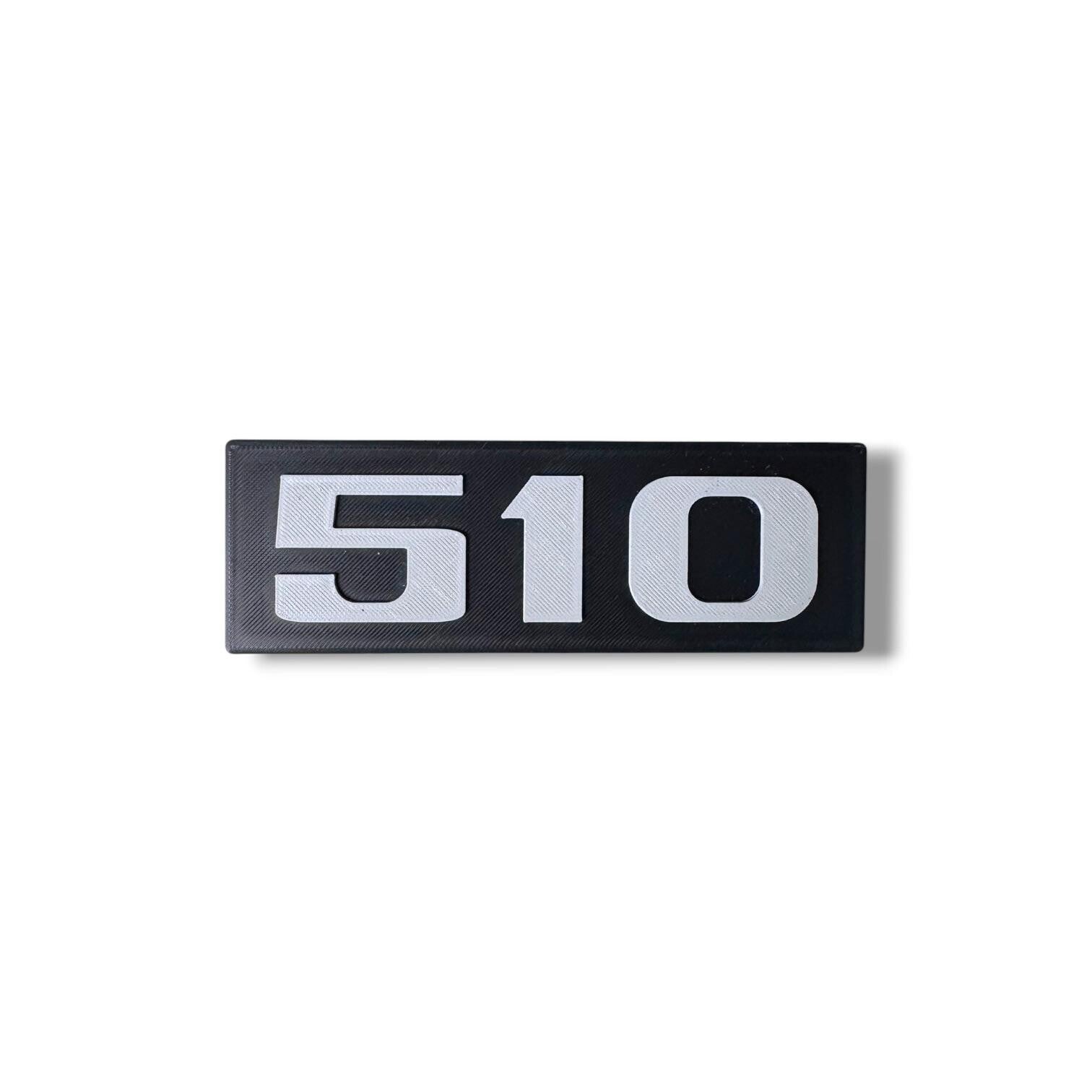 Embleem Mercedes 510 zijkant
