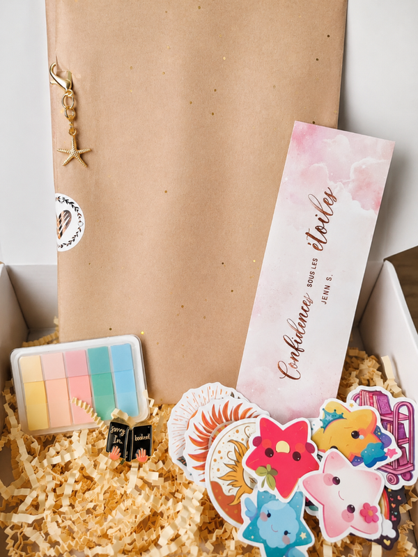 Box avec broché dédicacé.
