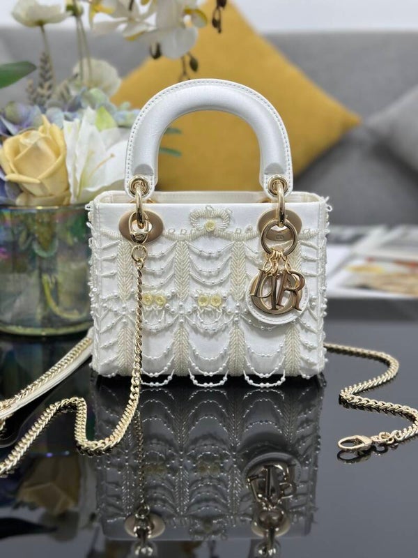 Lady Dior three-compartment mini bag