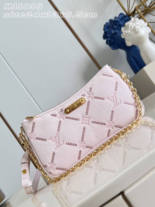 M29495 Monogram Empreinte Leather Liv pochette