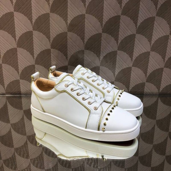 CL low-top sneakers red bottom