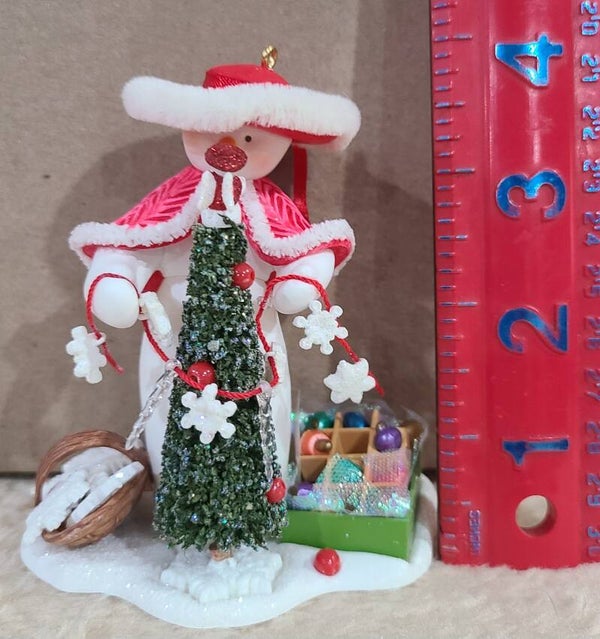2007 - Decorating Snow Lady - Hallmark Ornament
