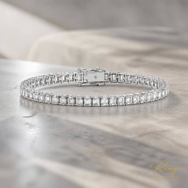 Bracelet tennis en or blanc 750/1000 et diamants taille émeraude 9,6 ct
