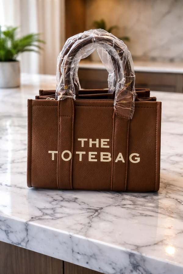 Stijlvolle bruine totebag met draaghendel