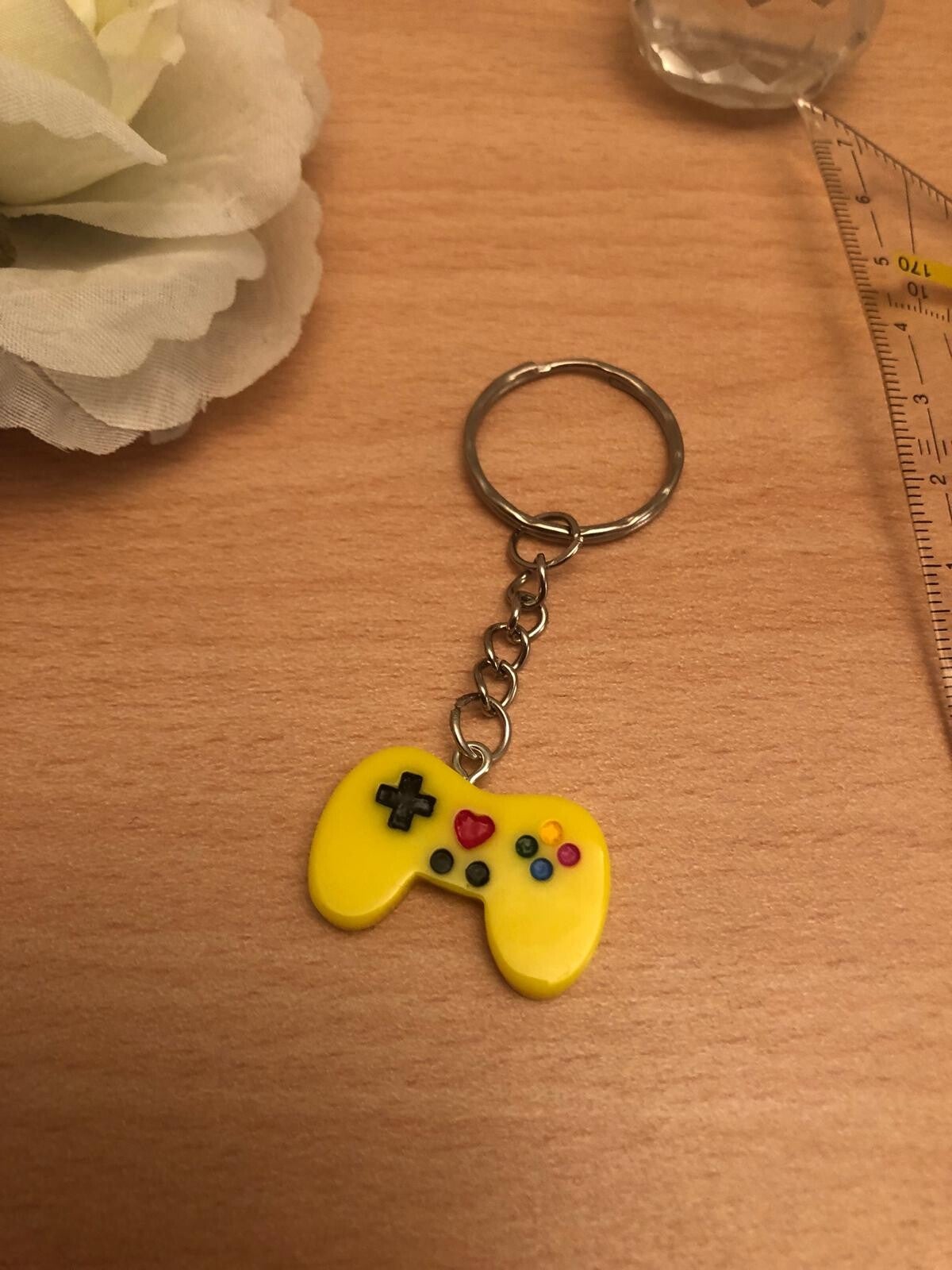 Sleutelhanger game console geel