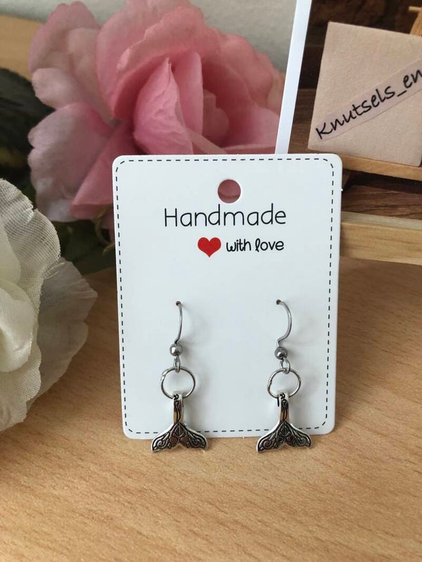 Samen Sterk: Rugvin; oorbellen staartvin.