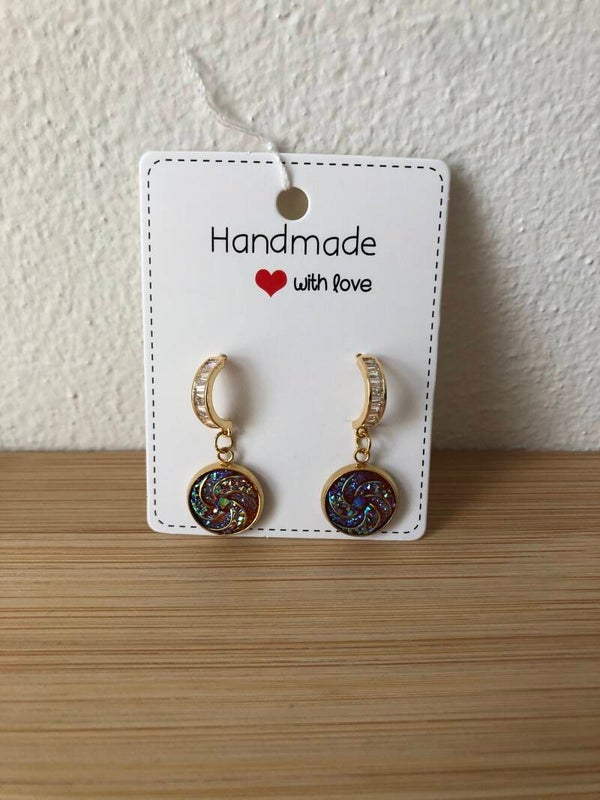Goudkleurige hangers paars/ roze glitter