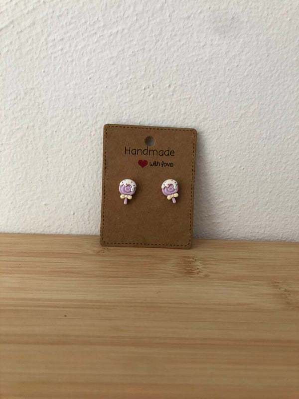 Oorstekers lollypop  paars met gele strik