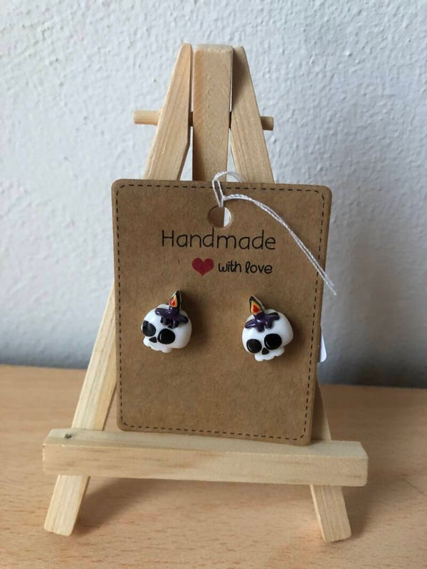 Oorstekers Halloween schedel met kaars