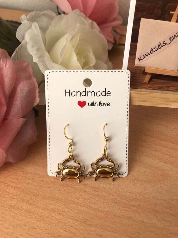 Oorbellen goudkleurige krabben