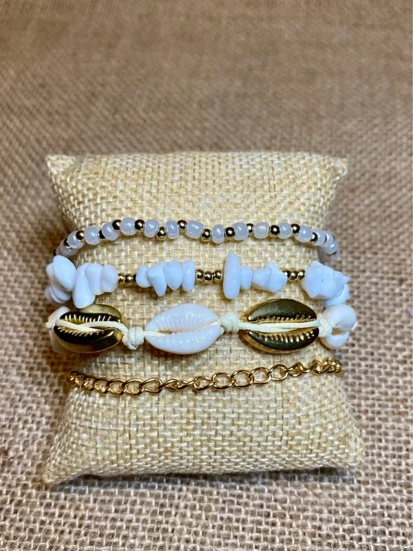 Ensemble 4 bracelets de cheville coquillages métal doré