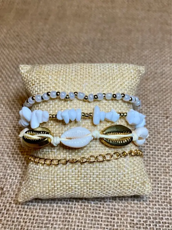 Ensemble 4 bracelets de cheville coquillages métal doré