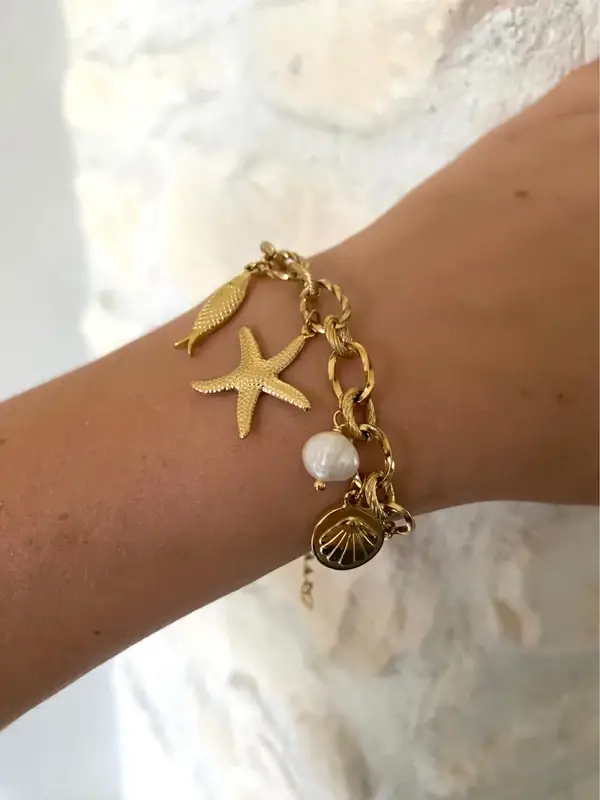 Bracelet acier inoxydable doré et breloques coquillages