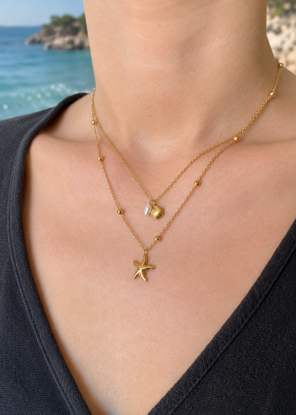Collier double chaîne étoile de mer, coquillage et perle d'eau douce