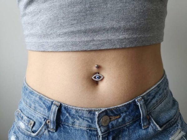 Piercing nombril oeil acier et strass