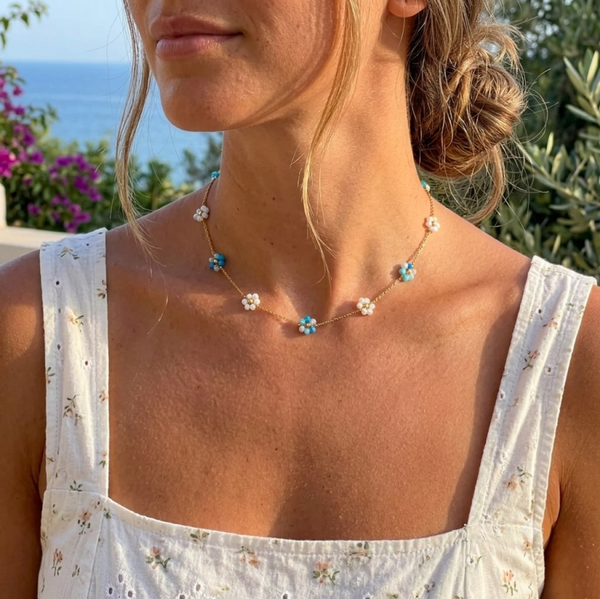 Collier acier inoxydable doré ras du cou fleurs cristaux bleus