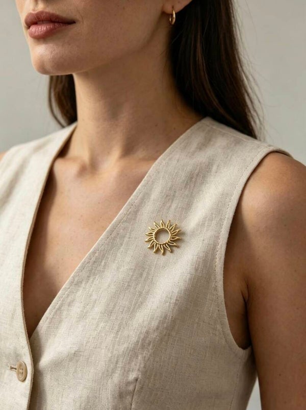 Broche soleil ajouré