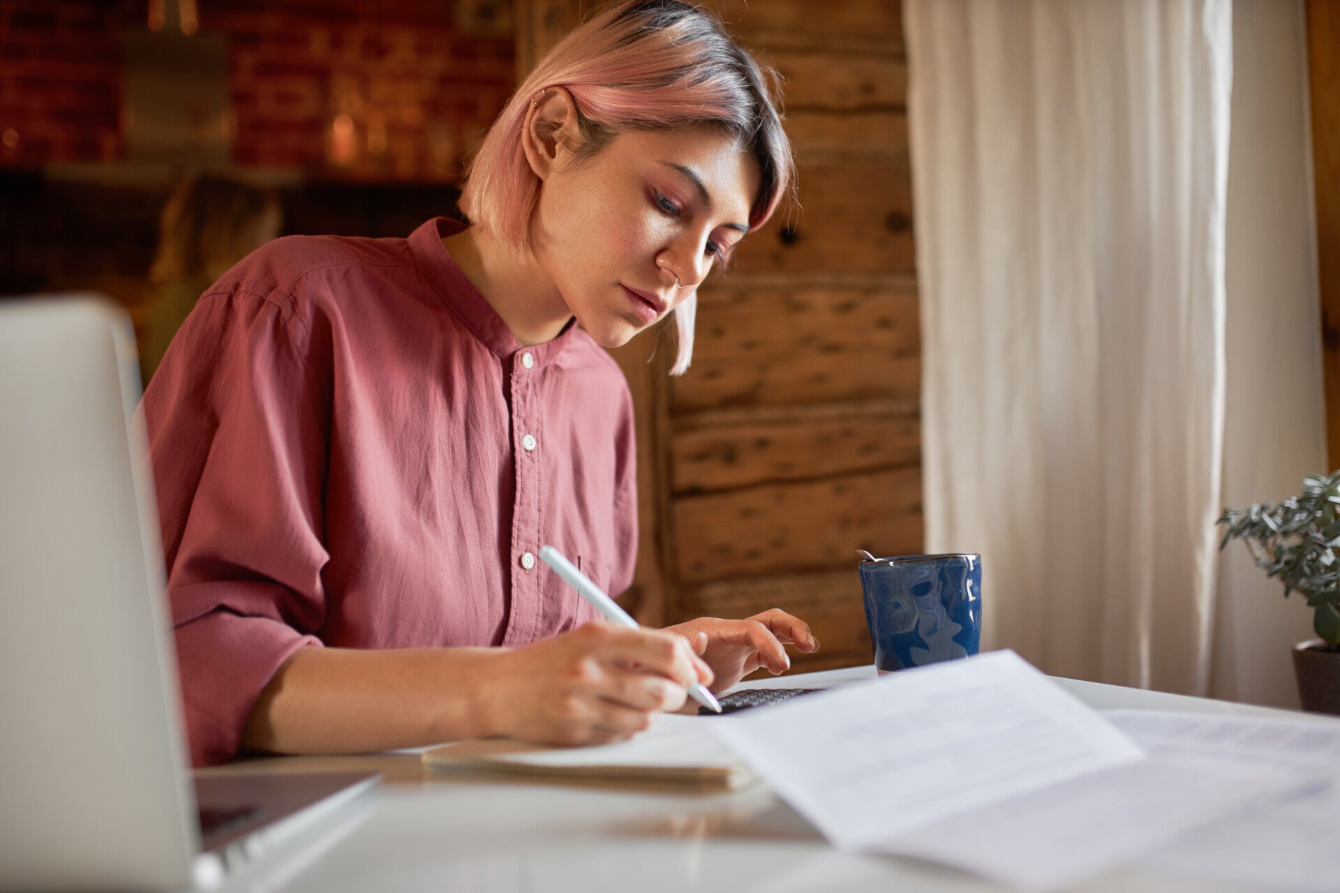 Lady filling out membership form