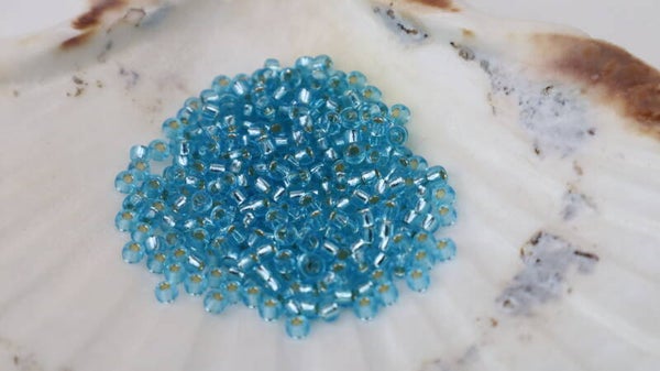 Seedbeads 8/0 Silverlined Aquamarine 0023