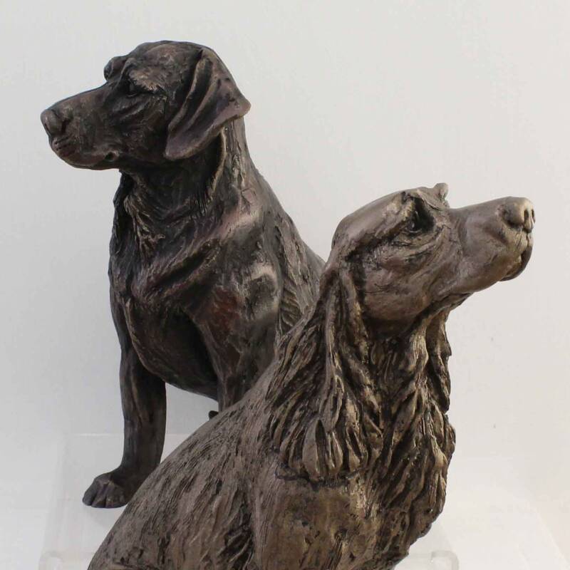 Two cold cast bronze statuettes of dogs. Click image to go to Sculpture page