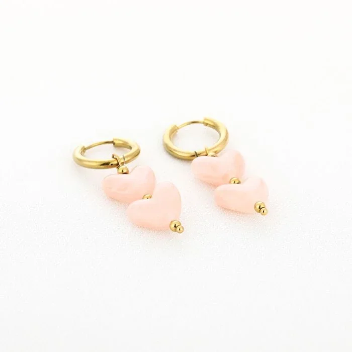 Hartjes oorbellen roze