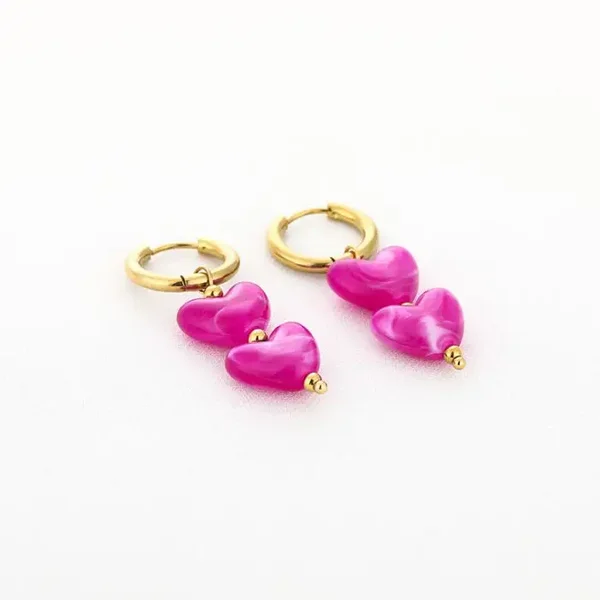 Hartjes oorbellen fucshia
