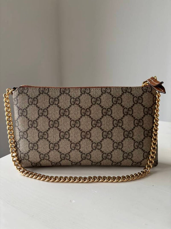 Gucci monogram pochette