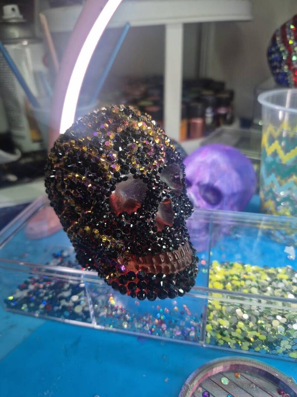 One of a kind rhinestoned resin skulls