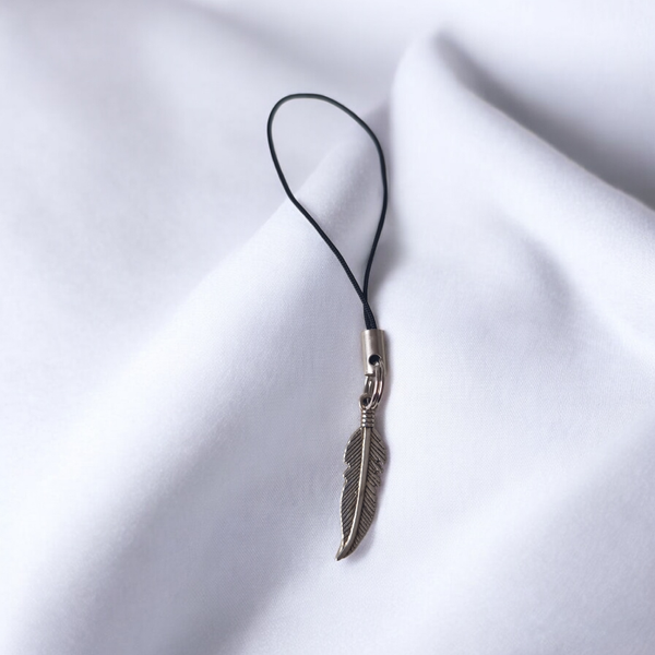 Petit bijou – Plume argentée