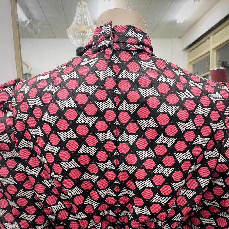 Detail rug met ingezette rits.