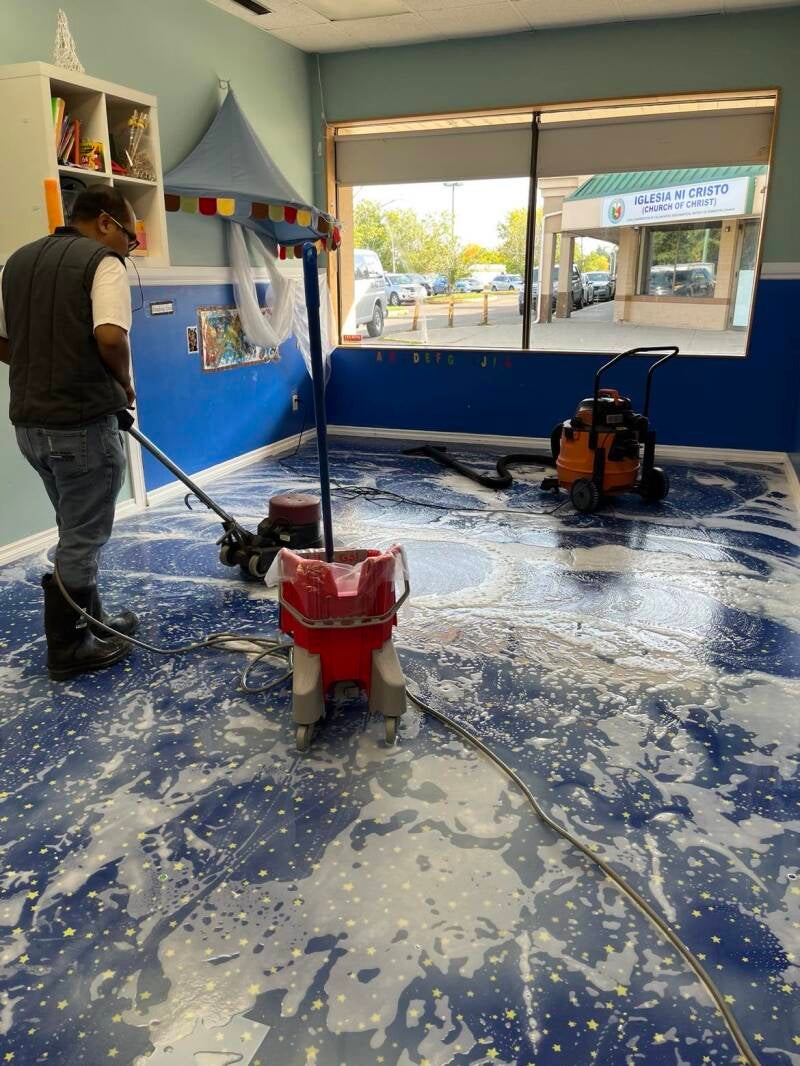 Stripping the floor.