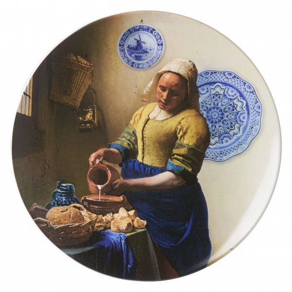 Wandbord melkmeisje met borden