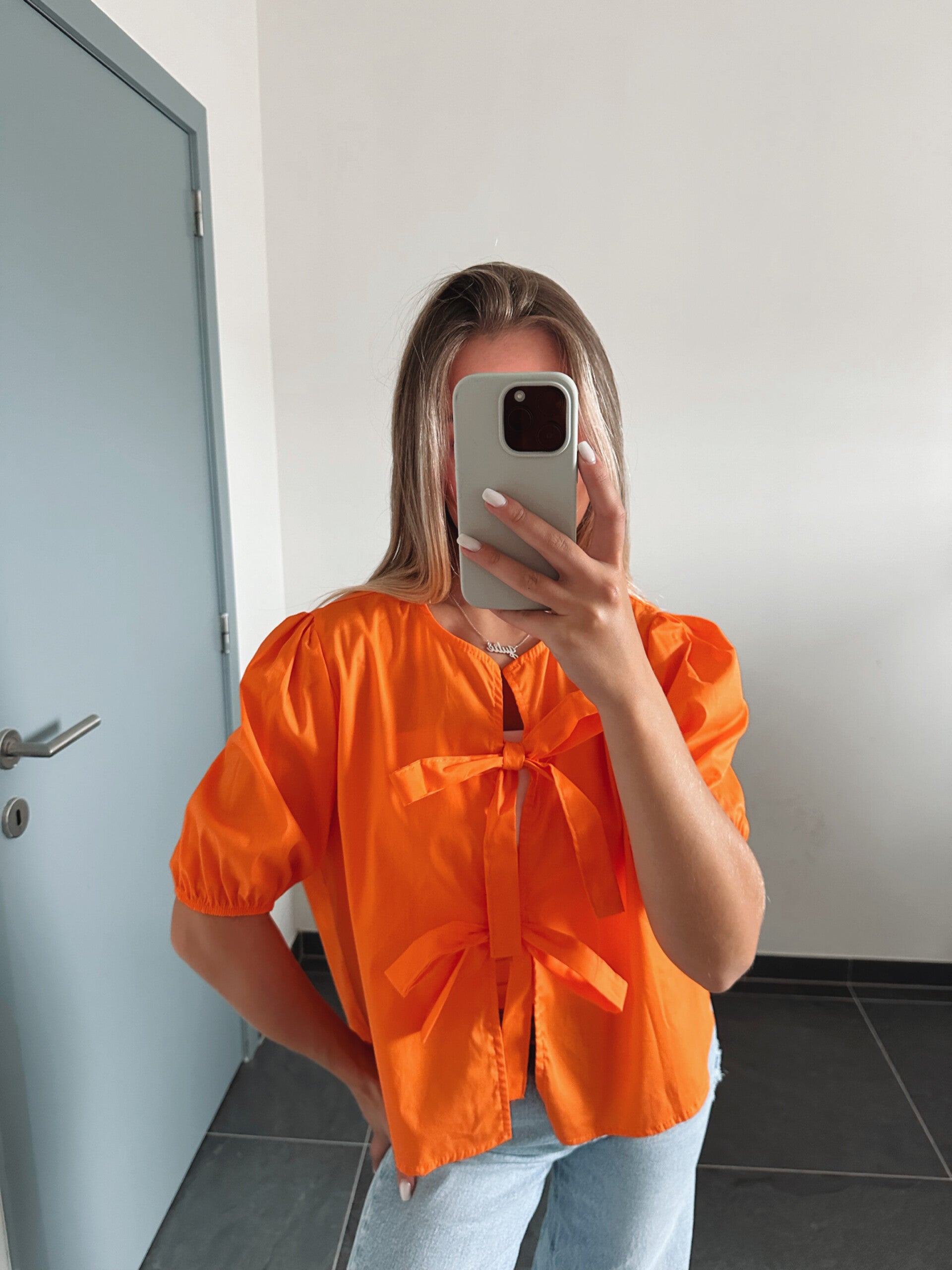Orange bow top