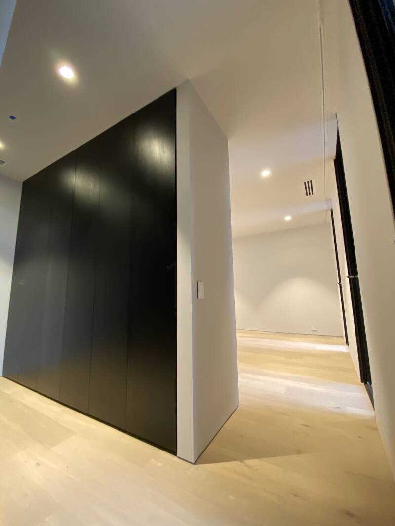 Black joinery and smooth white walls, interior painting, Melbourne
