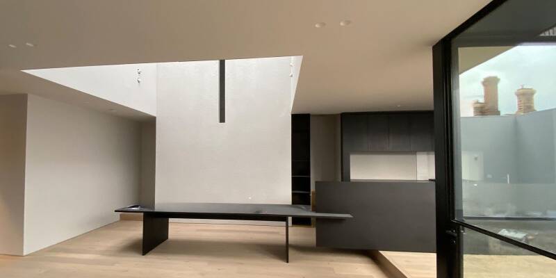 Open-plan living with skylight void, interior painting, Melbourne