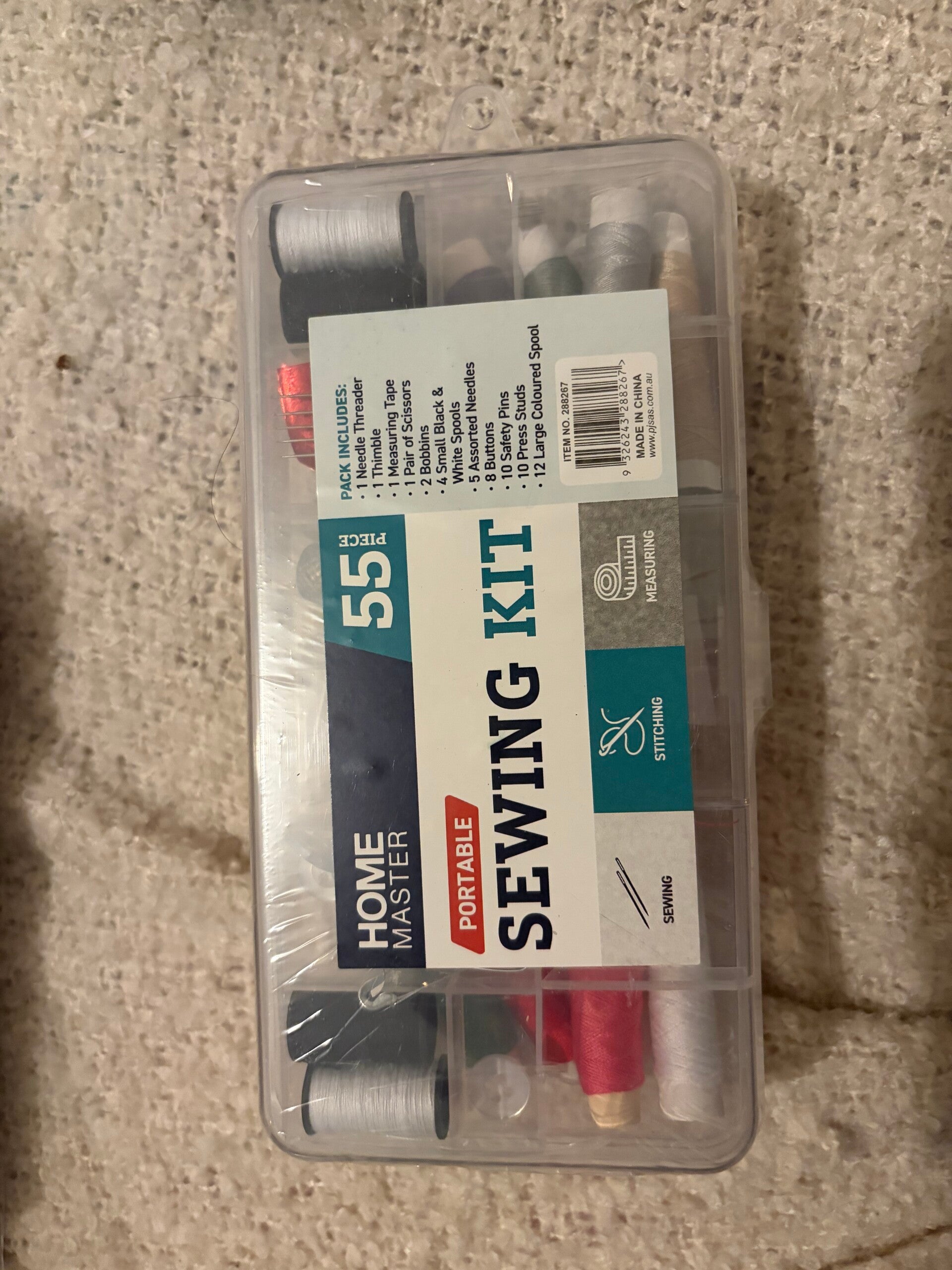 55 piece sewing kit.