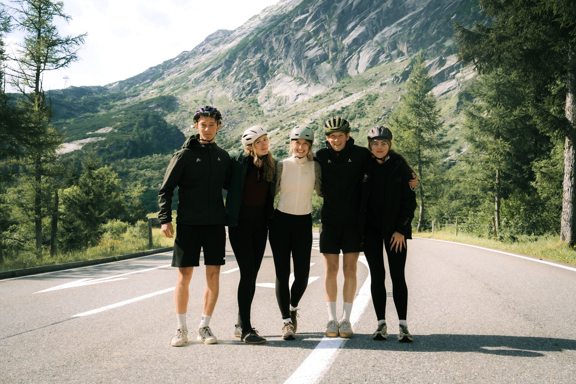 Cyclists riding together on a Swiss Alpine route