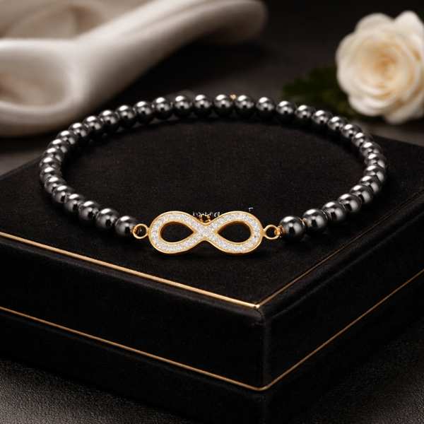 Bracelet hématite et signe infini doré