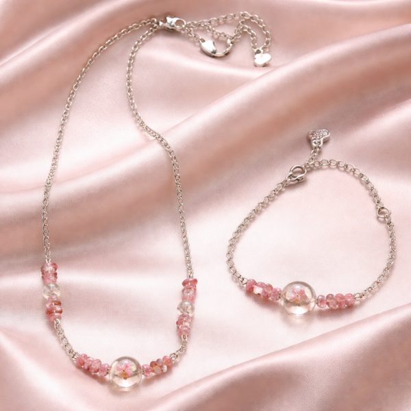 Parure chaîne et bracelet réglable fleur de Sakura