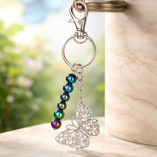 Porte clé papillon et hématite arc en ciel