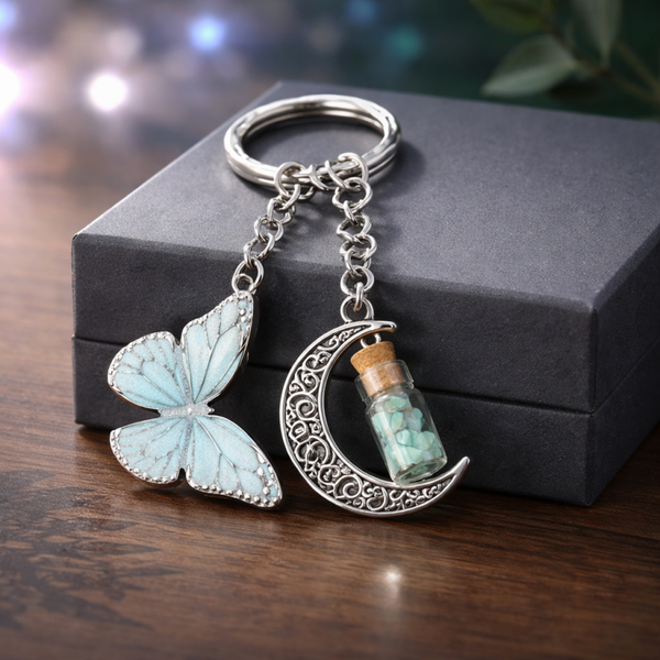 Porte clé papillon et lune fiole
