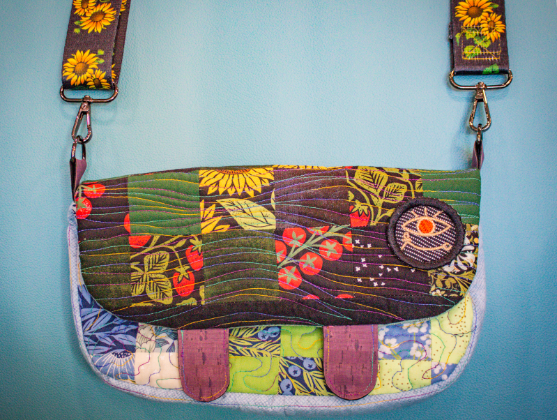 Self-drafted 1990s-inspired baguette shoulder bag made from quilted patchwork fabrics with sunflower motifs