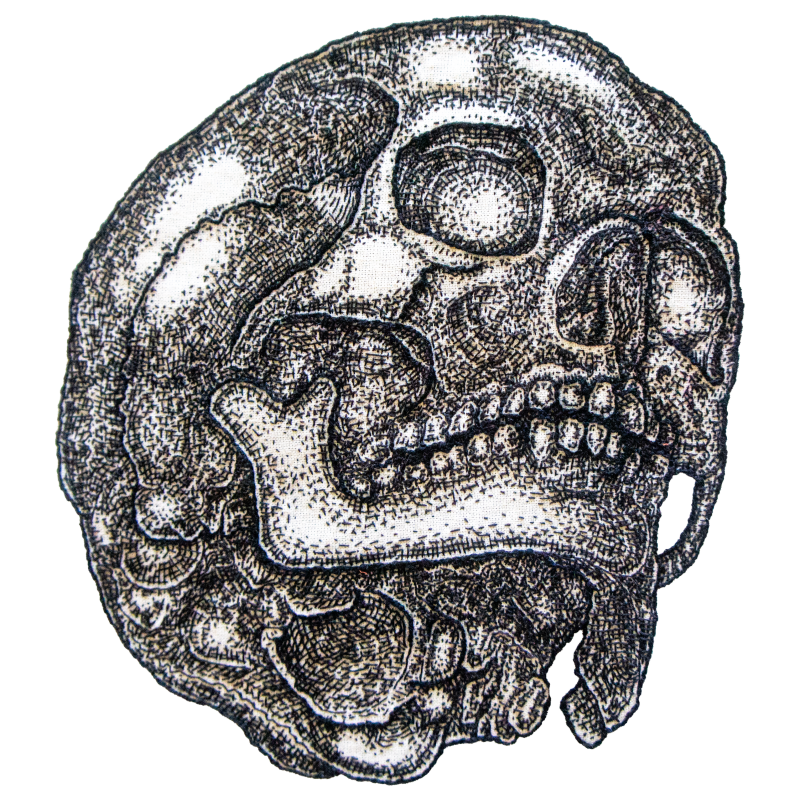 Embroidery artwork of a skull rendered through fine cross-hatching. The piece focuses on the intricate texture and detail created by the stitching, emphasizing form and precision.