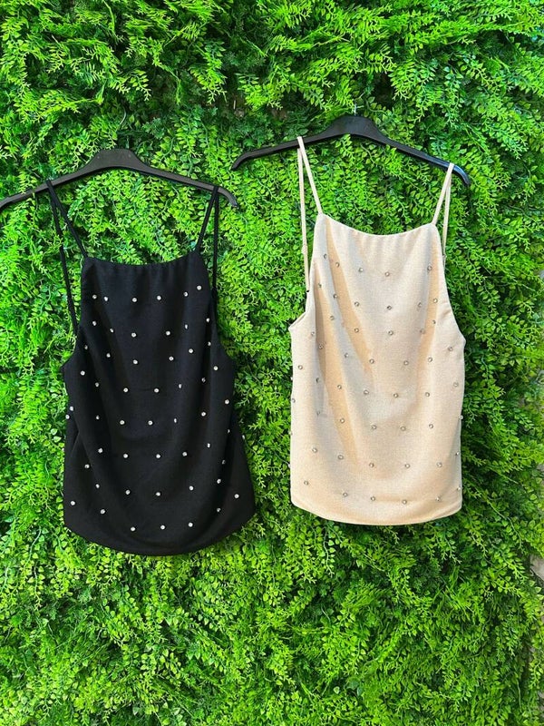 Top elegante con brillanti