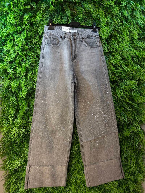 Jeans brillantinato con risvolto