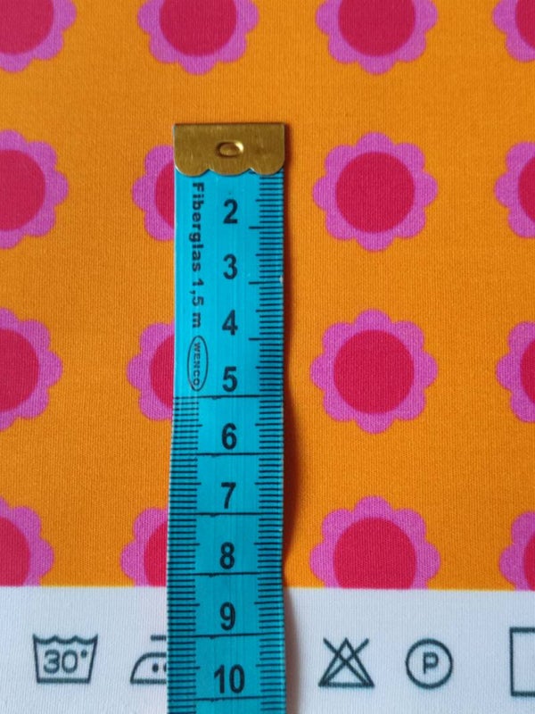 Baumwollstoff Gießblume orange