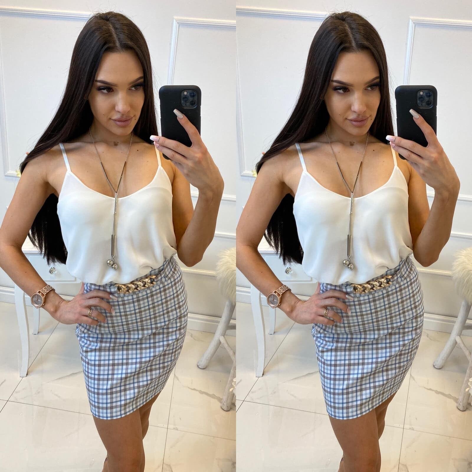 short skirt decorated with a gold chain