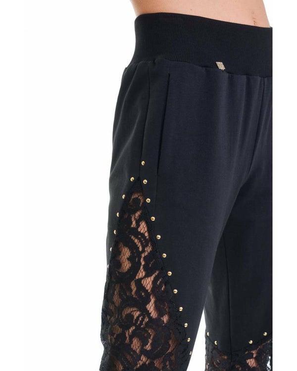 TROUSERS WITH LACE INSERTS AND LOGATED RIVETS